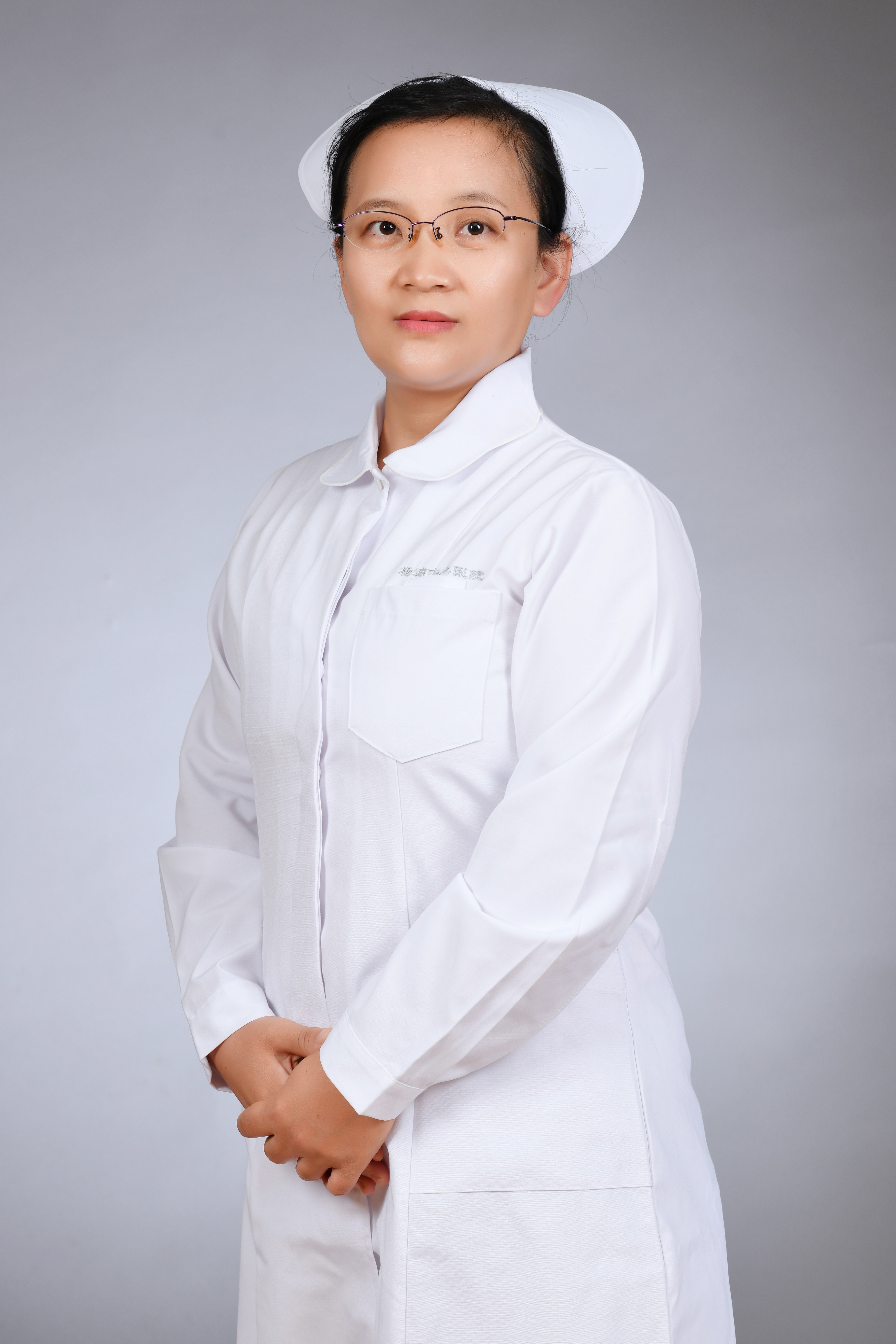 Yan WangMrs