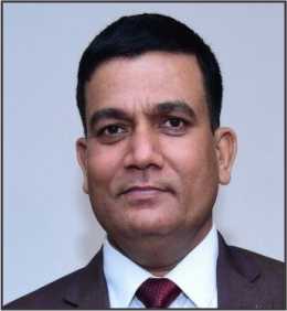 Dr. Krishna Kumar, Treasurer