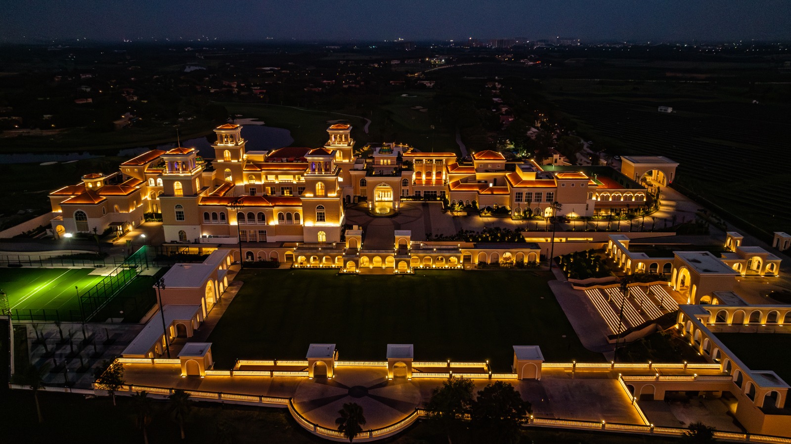 Illuminated KBG Club and Imperial Lawns at night