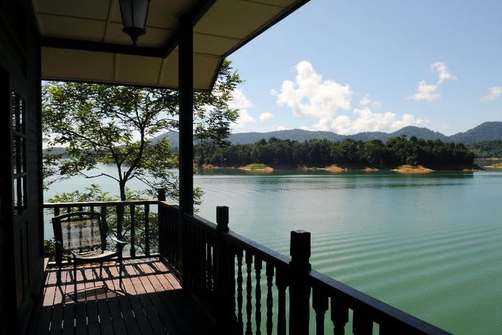 Lakeside chalet at Lake Kenyir Resort surrounded by rainforest in Terengganu